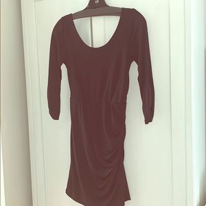 Black cocktail dress with open back & ruche detail